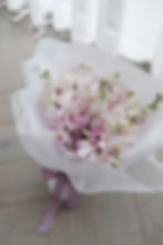 Elegant orchid arrangement in soft, muted colours