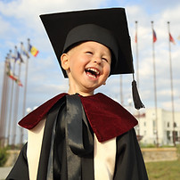 Kid in Graduation Gown