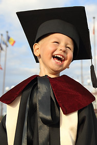 Kid in Graduation Gown