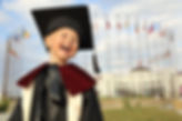 Kid in Graduation Gown