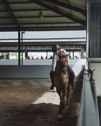 young-woman-trains-horseback-riding-arena-young-caucasian-woman-formal-clothing-horseback-