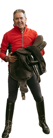 amateur-horse-rider-red-jacket-indoor-riding-arena.png