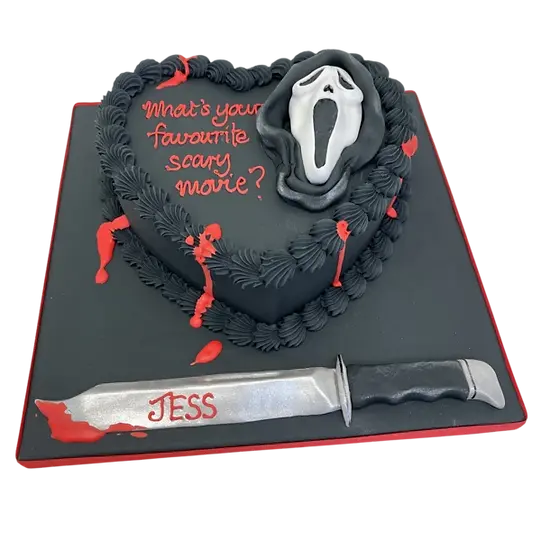 Bespoke celebration cake in Solihull, West Midlands featuring a Stabber figure and Ghost Mask from Scream movie.