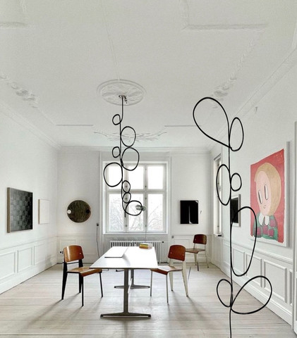 There are two major categories of our new work, Fluid forms, and what we call Ink Forms.  

The later is a representation of literal ink on paper, as a sketch or freehand expression of a form, that ends in the unrefined motion of a line in light.  The Ink Forms are very difficult to make, as the complexity of compound curves and balance is thus subject to the rigidity of the LED's.  
As all of these forms are made without the use of machines or computers (on purpose) it has taken years to perfect this seamless un-compromised, sculptural, continuous light.  

As you may know the light itself is a seamless fluid form, with no detection of individual LED's.  The effect, regardless of the Fluid Forms  or Ink Forms, is that of a light drawing suspended in space.
-Marcus Tremonto
Dan Flavin.
James Turell.
Brice Mardin.