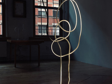 There are two major categories of our new work, Fluid forms, and what we call Ink Forms.
The later is a representation of literal ink on paper, as a sketch or freehand expression of a form, that ends in the unrefined motion of a line in light. The Ink Forms are very difficult to make, as the complexity of compound curves and balance is thus subject to the rigidity of the LED's.
As all of these forms are made without the use of machines or computers (on purpose) it has taken years to perfect this seamless un-compromised, sculptural, continuous light.
As you may know the light itself is a seamless fluid form, with no detection of individual LED's. The effect, regardless of the Fluid Forms or Ink Forms, is that of a light drawing suspended in space.
-Marcus Tremonto
Dan Flavin.
James Turell.
Brice Mardin.