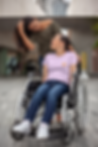 mockup-of-a-girl-using-a-wheelchair-while-wearing-a-tshirt-with-her-friend-a21366_edited.p