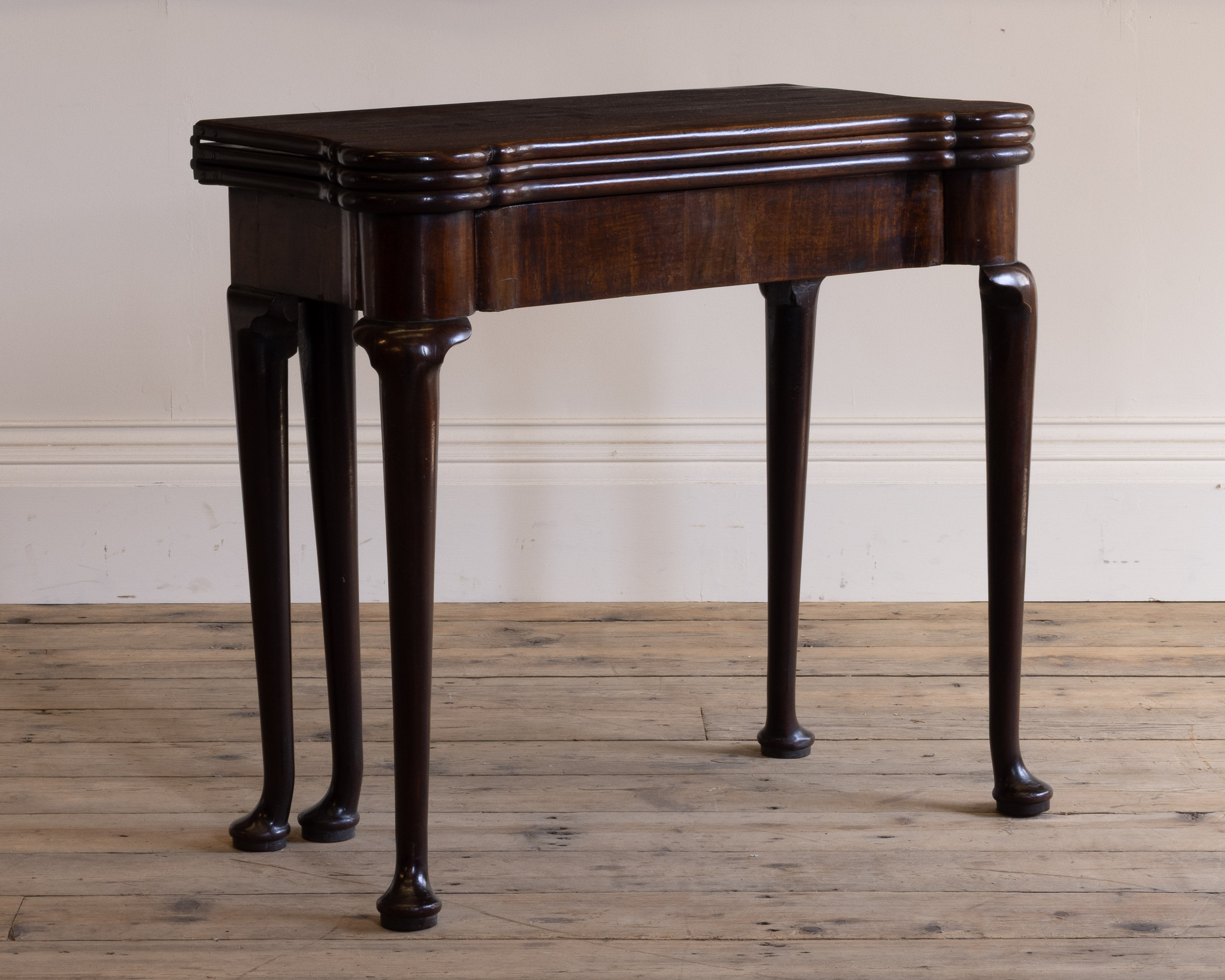A George II mahogany games table
