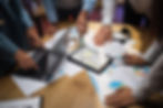 financial-experts-examining-trade-market-during-me-2026-01-07-01-25-38-utc.jpg