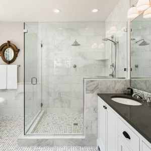 Elegant Marble and Brass Shower Designs