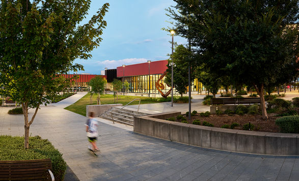 public pool, Oran Park Sydney, kid on scooter, dusk sky, long exposure, architectural photography, construction photography, Sydney architectural photographer, blue sky, glass pains, south west sydney, building photgrapher