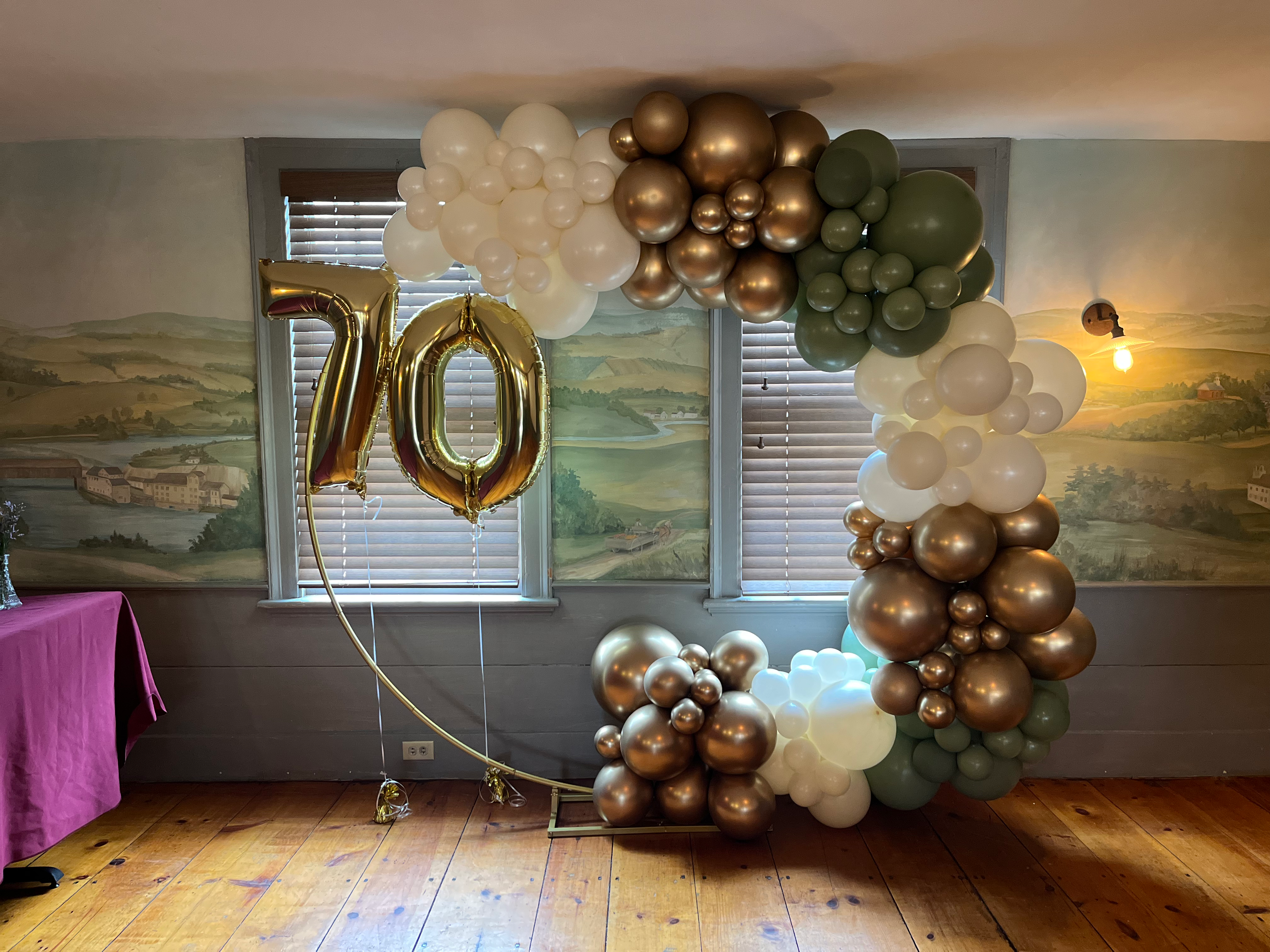 Gold ring rental 10’ garland number on weight set up 