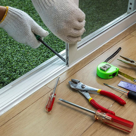 worker-fixing-insect-screen-sliding-door_176124-2861.jpeg