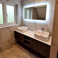 Backlit mirror in bathroom