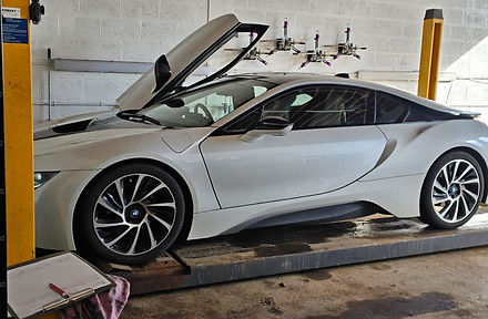 BMW car on ramp with door open