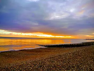 Serene beach scene at sunset
