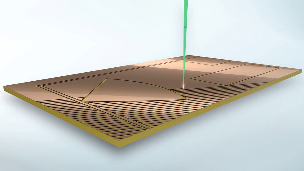 Angled view of an industrial laser beam cutting circuit traces neatly
