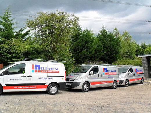 Duraseal vans parked outdoors
