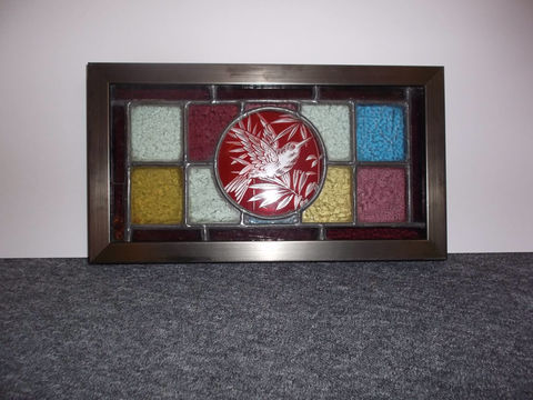 Stained glass frame with bird design