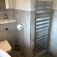 a fitted bathroom included fitted towel rail 