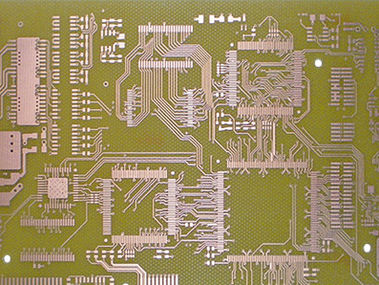 Overhead perspective of ultra fine copper circuit layouts on dark background