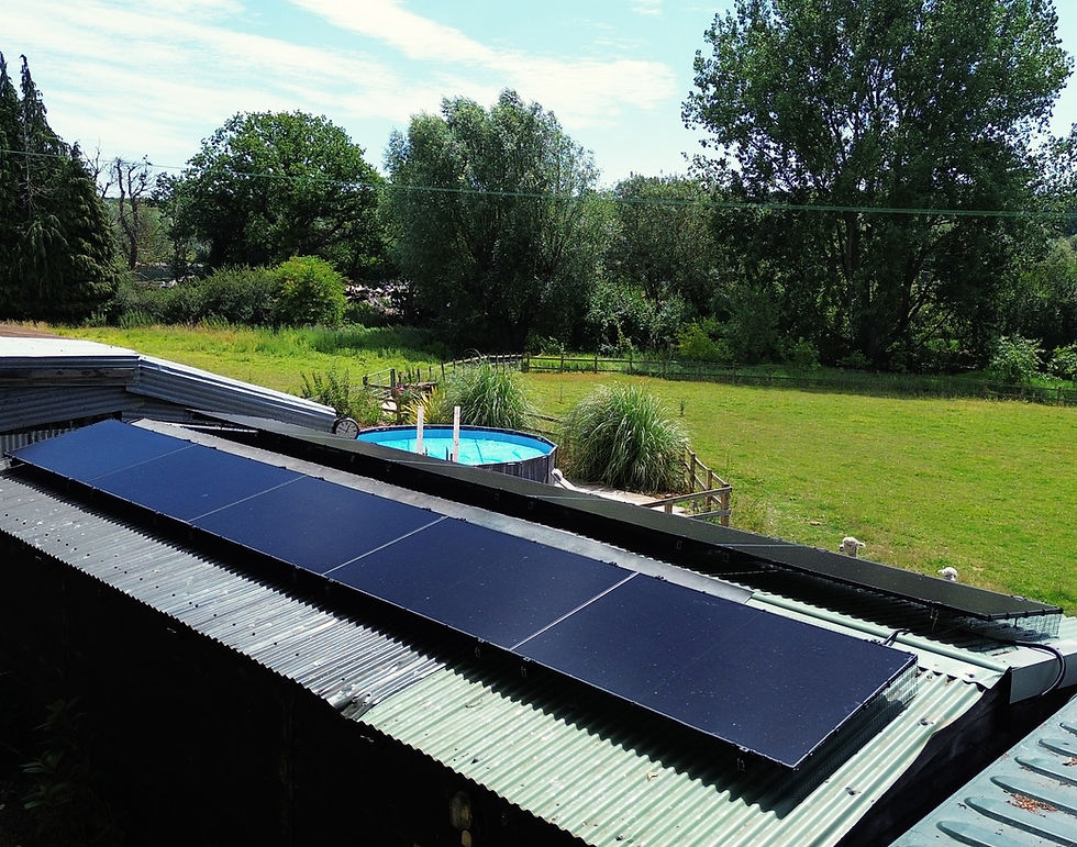 Solar panels installed on a corrugated metal shed roo