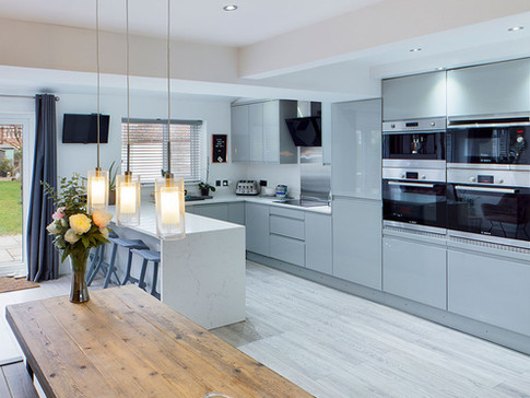 Modern kitchen with sleek grey cabinets