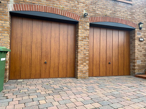Decograin wood-effect double garage doors fitted by J&J Garage Doors in Lenzie