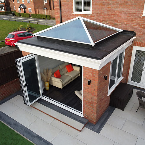 small extension with flat roof and roof lantern