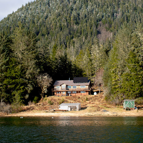 Waterview of property and house nestled in Petersburg Mountain, Waterfront Homestead for sale, Kupreanof Island Alaska