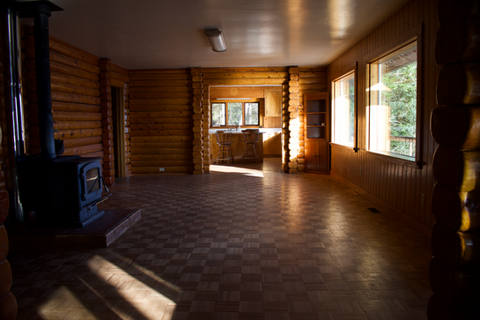 2nd floor - Living area, looking north into kitchen, Waterfront Homestead for sale, Kupreanof Island Alaska
