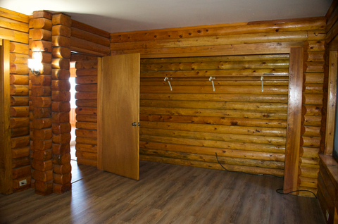 2nd floor, interior master bedroom, east facing closet 2 of 2, log interior, Waterfront Homestead for sale, Kupreanof Island Alaska