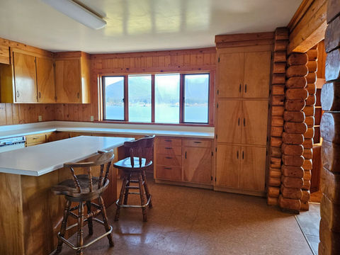 Wood interior large Kitchen area, kitchen island, east facing water view, Waterfront Homestead for sale, Kupreanof Island Alaska