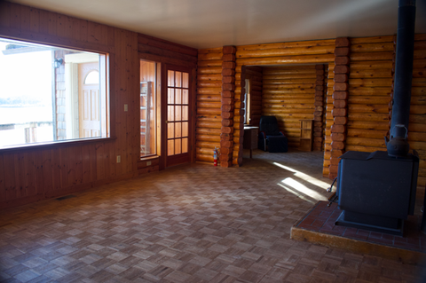 2nd floor - Interior deck entry in living area south facing entry into den area, Waterfront Homestead for sale, Kupreanof Island Alaska