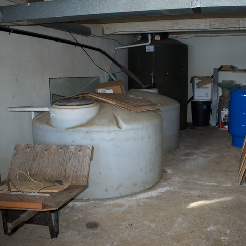 1st floor, daylight basement, 2 water storage tanks and pump, - 4,000 gallons Waterfront Homestead for sale, Kupreanof Island Alaska