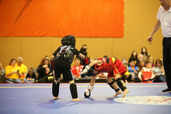 Kids sparring at MMA, kick boxing, self defense class