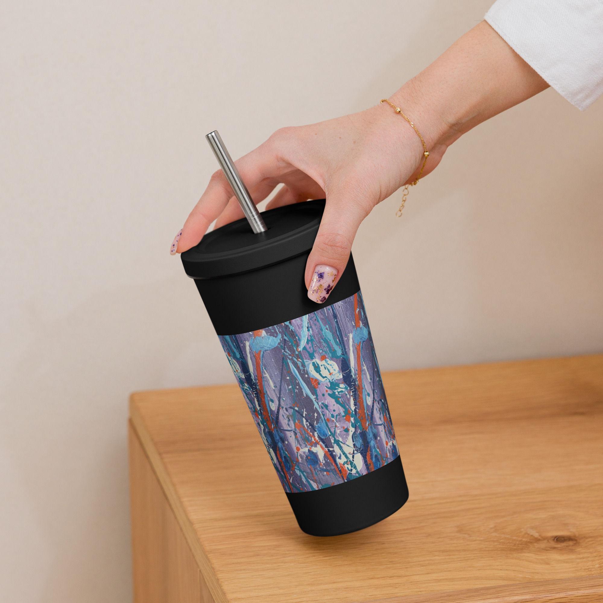 Insulated tumbler with a straw