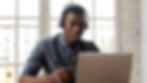A man using a laptop computer