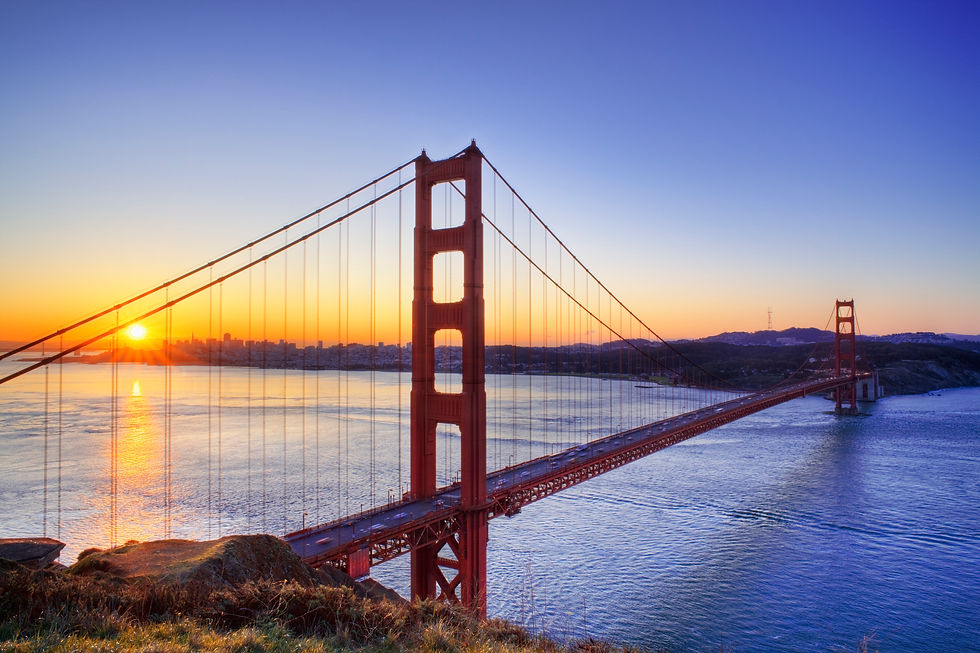 Sunrise behind the Golden Gate Bridge