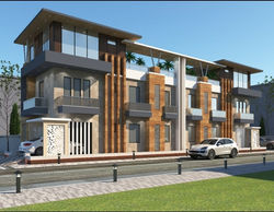Modern dual-unit commercial building with timber detailing and rooftop spaces in NCR.