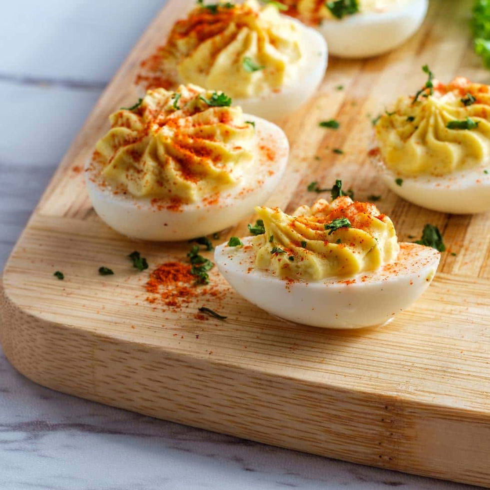 deviled eggs with hot sauce on them