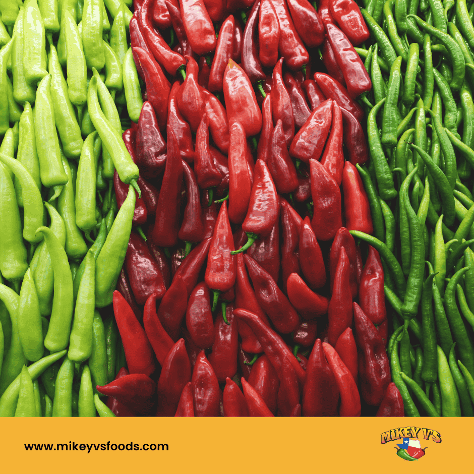 piles of red green and dark green chili peppers