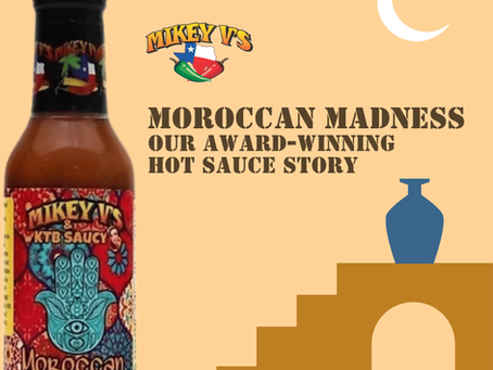 Mikey V's Moroccan Madness hot sauce bottle beside bold promo text, crescent moon, and blue vase on desert-style steps.