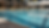 Eye-level view of a sparkling saltwater pool with clear blue water