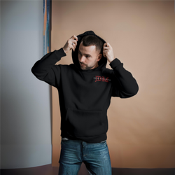 Man wearing a black hoodie with JDM Auto Culture logo on it, standing in a neutral setting