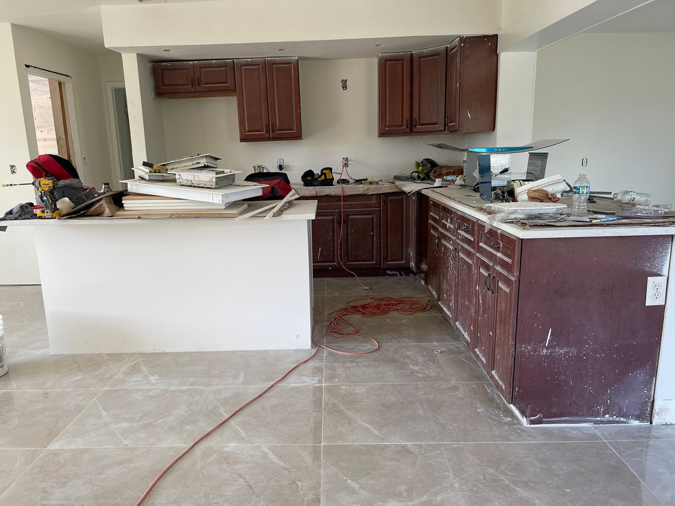 Freshly painted kitchen cabinets with a modern and smooth finish.