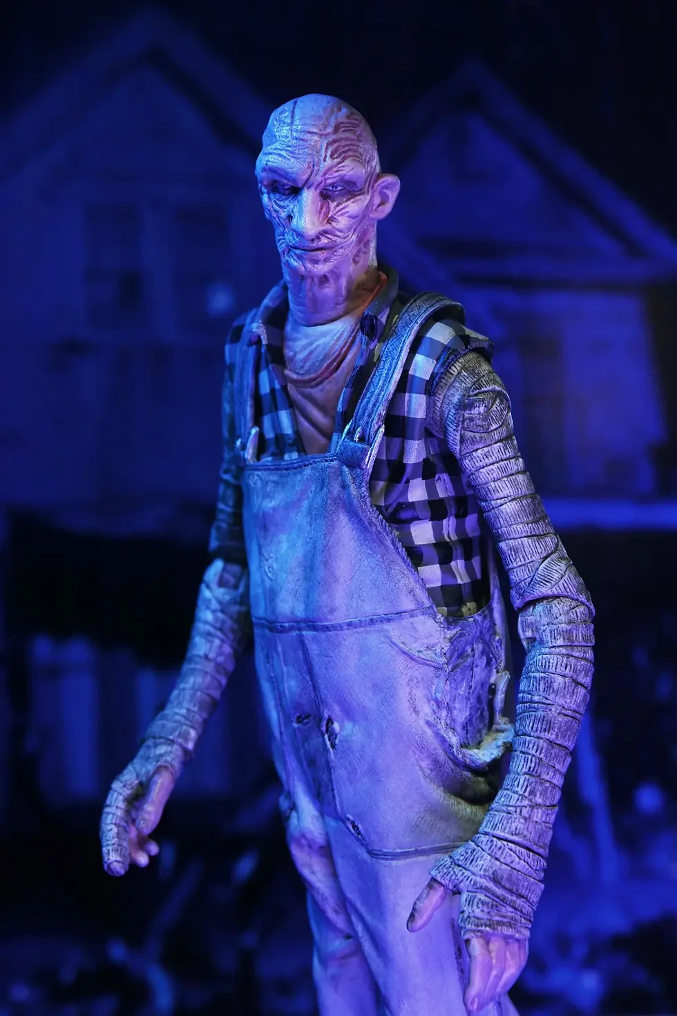 Thumbnail: NECA: The Devil’s Rejects – Tiny (Overalls) 7″ Scale Action Figure (NEW)