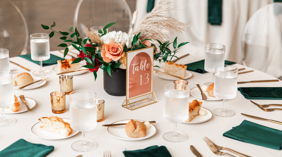 wedding reception round table centerpieces with floral and greenery