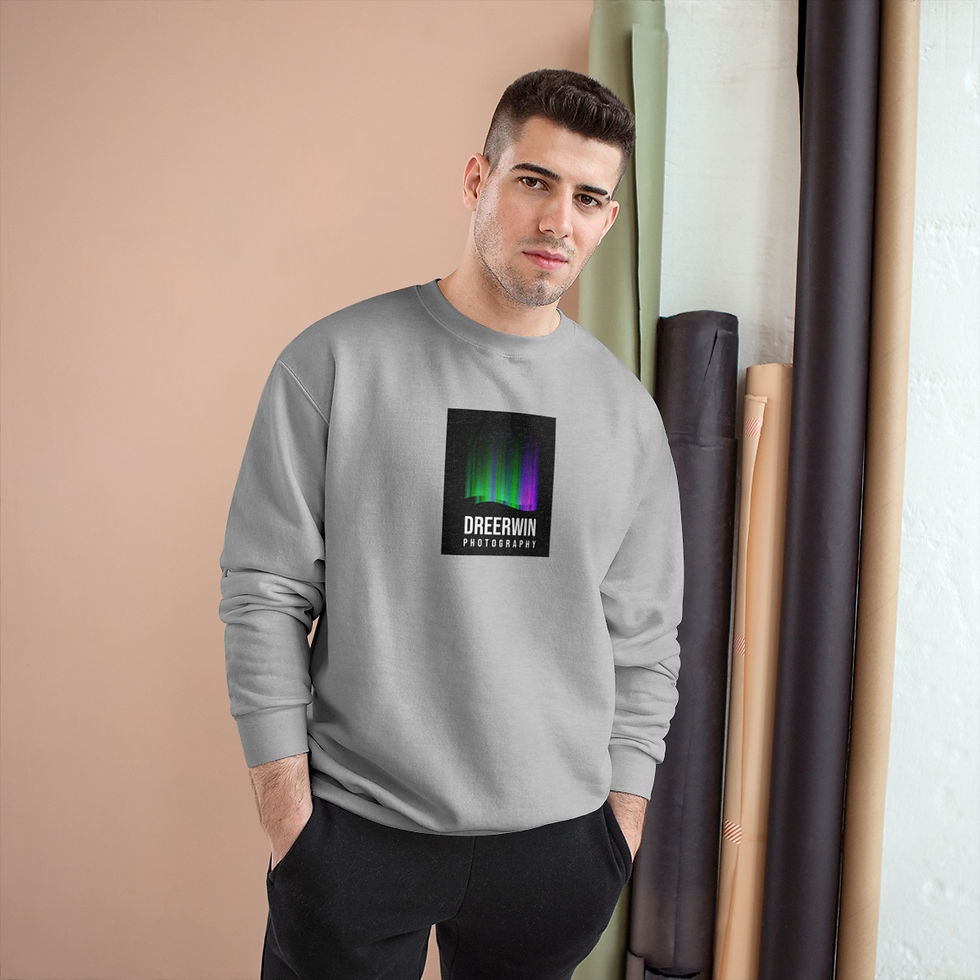 Miniature : Two individuals wear Dre Erwin Photography's Aurora Borealis Edition sweaters, showcasing vibrant Northern Lights-inspired de