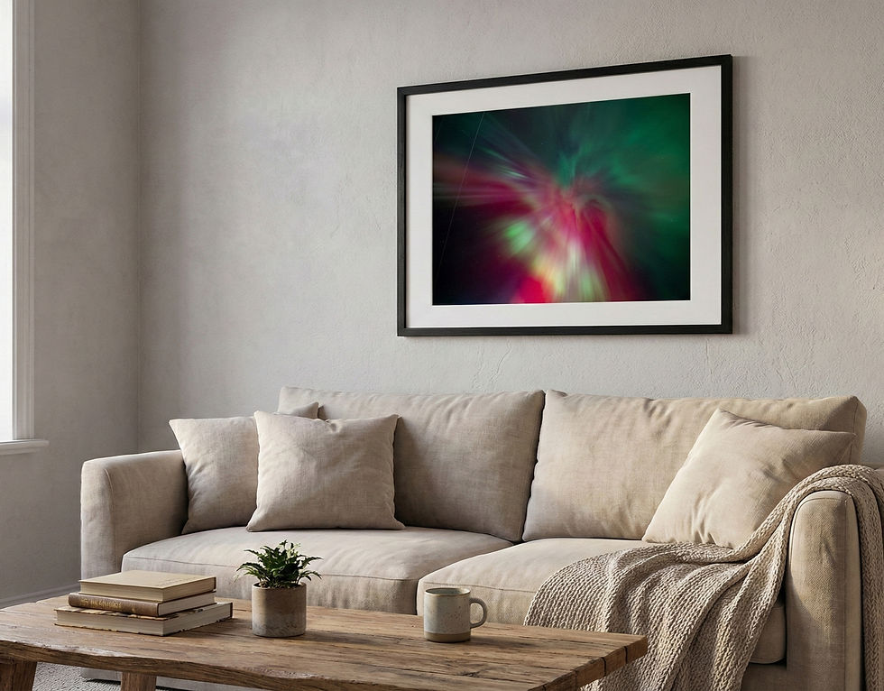 Miniature : Framed red aurora borealis corona wall art captured in Northern Saskatchewan, hanging in a modern living room.