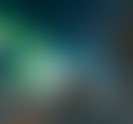 Man in front of the northern lights, in Pinehouse Lake